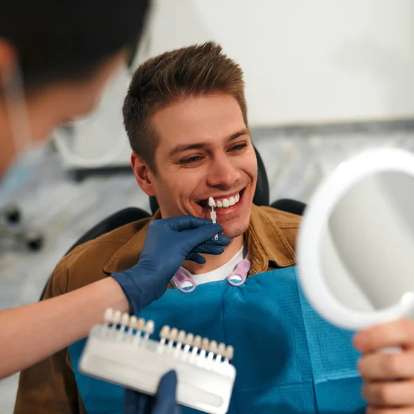 male patient exploring tooth color options